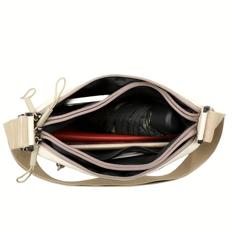 Stilvolle Crossbody Handtasche mit Reißverschluss mit Innenfächern