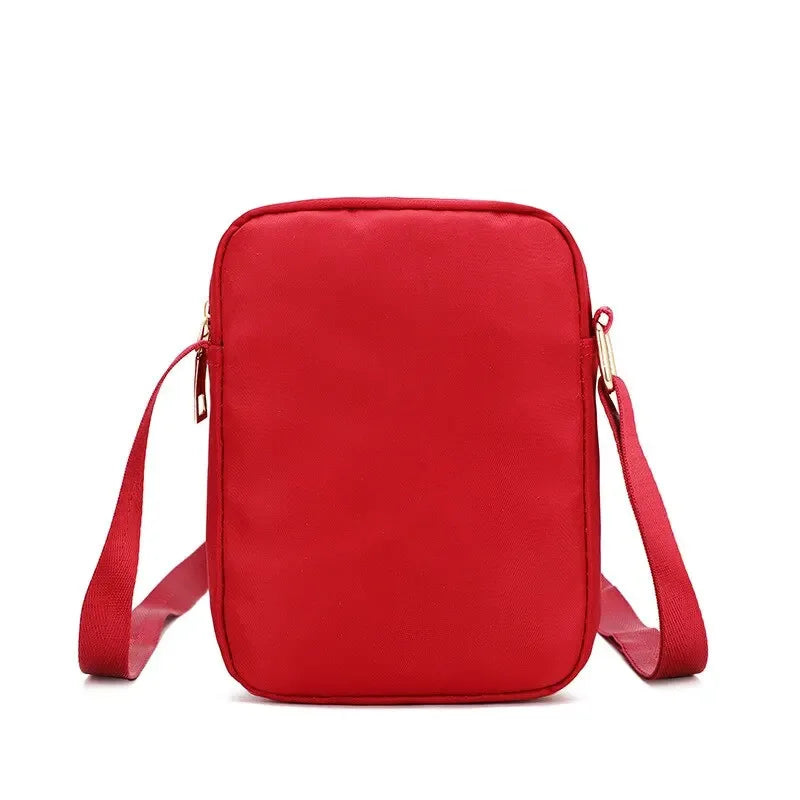 Kompakte Crossbody Handtasche Lederoptik mit Reißverschluss mit