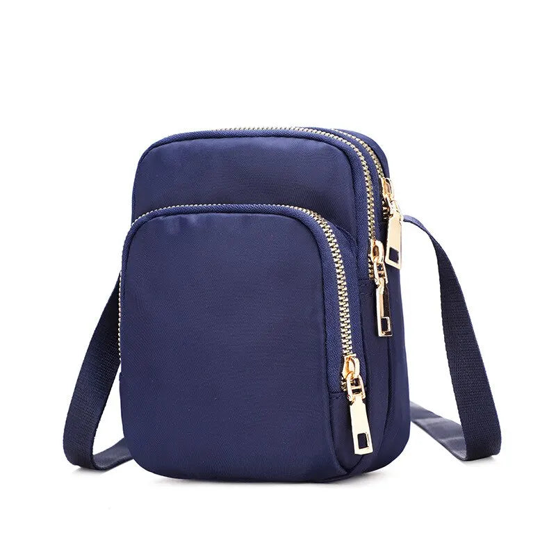Kompakte Crossbody Handtasche Lederoptik mit Reißverschluss mit