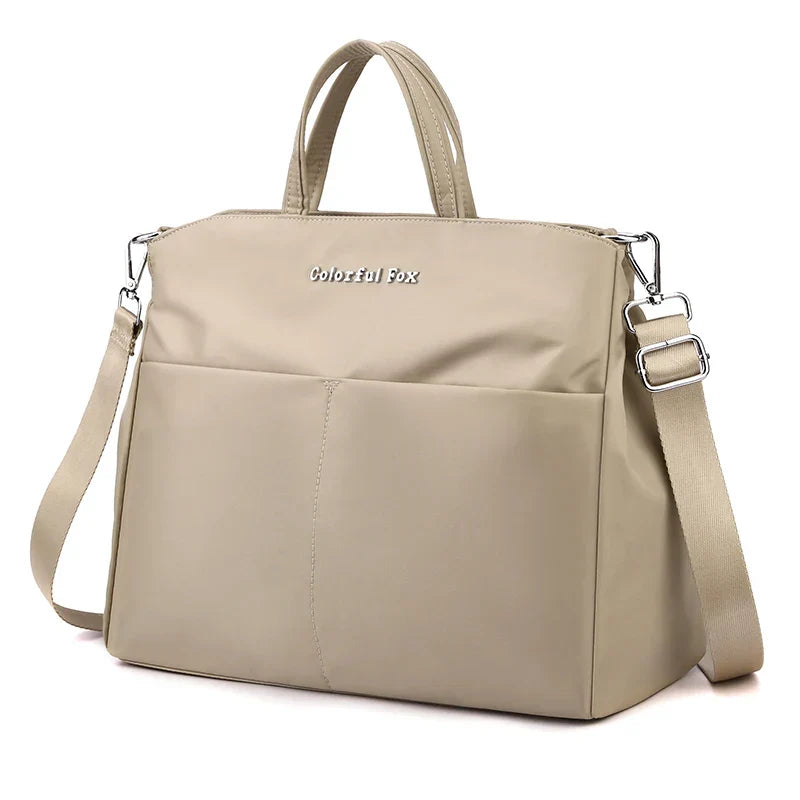 Stylish shopper in leather look with zipper and inner compartments