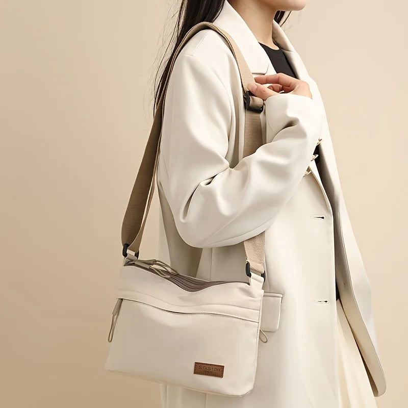 Stilvolle Crossbody Handtasche mit Reißverschluss mit Innenfächern