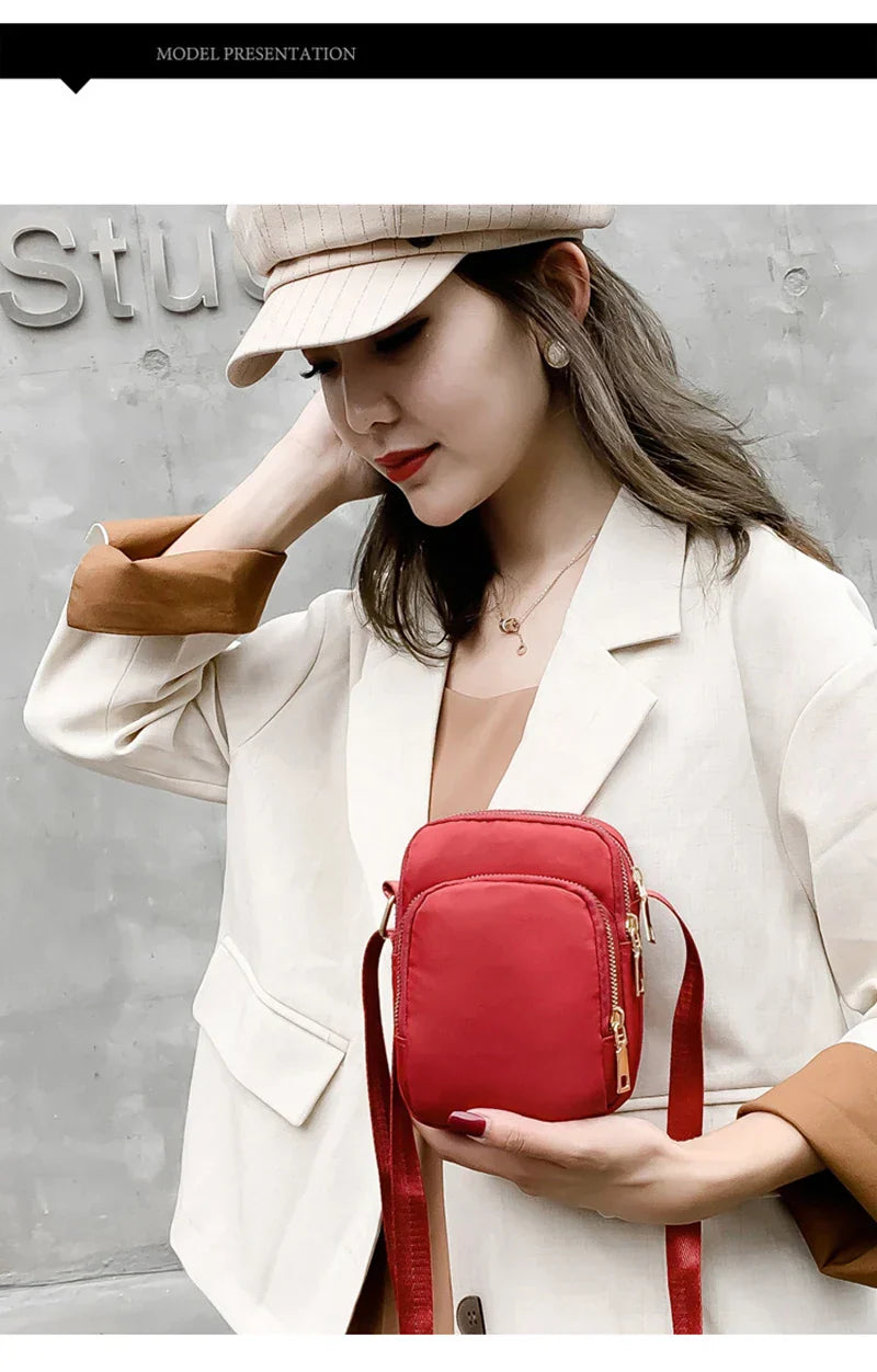 Kompakte Crossbody Handtasche Lederoptik mit Reißverschluss mit
