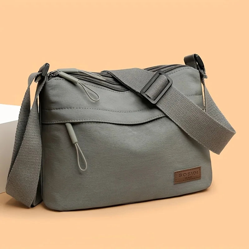 Stilvolle Crossbody Handtasche mit Reißverschluss mit Innenfächern