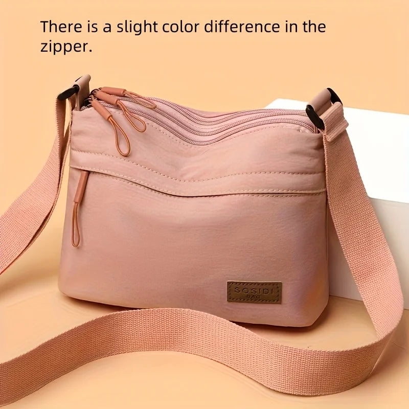Stilvolle Crossbody Handtasche mit Reißverschluss mit Innenfächern