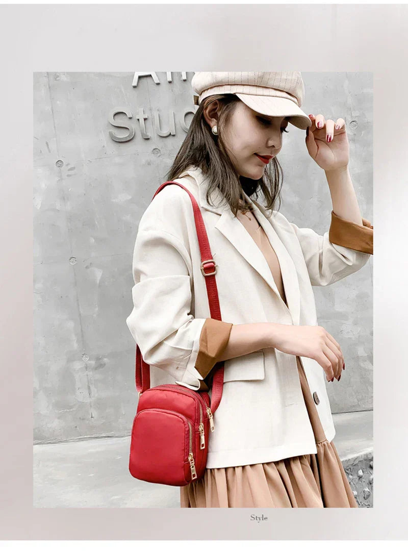 Kompakte Crossbody Handtasche Lederoptik mit Reißverschluss mit