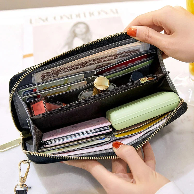 Compact faux leather crossbody bag with zipper with