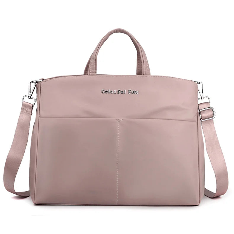 Stylish shopper in leather look with zipper and inner compartments
